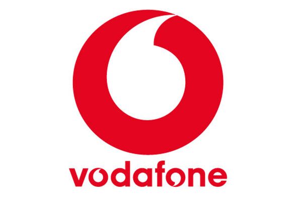 Ein einfaches, aber markantes Bild des Vodafone-Logos in Rot, das die globale Telekommunikationsmarke repräsentiert.